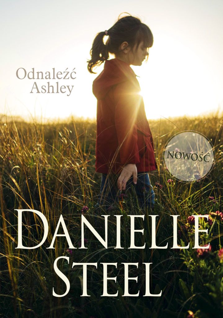 Na okładce odwrócona w prawą stronę dziewczynka w czerwonej kurtce idzie wśród wysokiej trawy. W tle blask słońca.