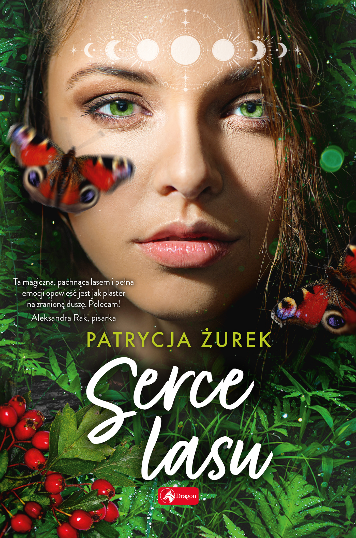 Na okładce ywarz kobiety z zielonymi oczami, w tle zieleń traw, liści, kolorowe motyle.