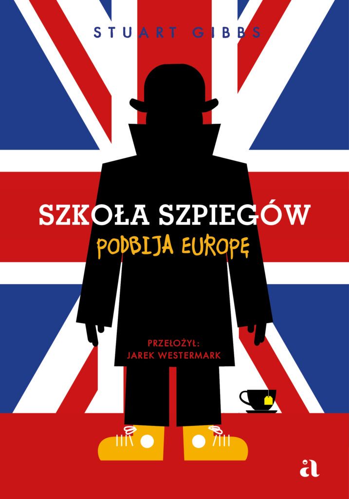 Okładka rysunkowa. Czarna postać w płaszczu i kapeluszu oraz żółtych butach na tle flagi Wielkiej Brytanii